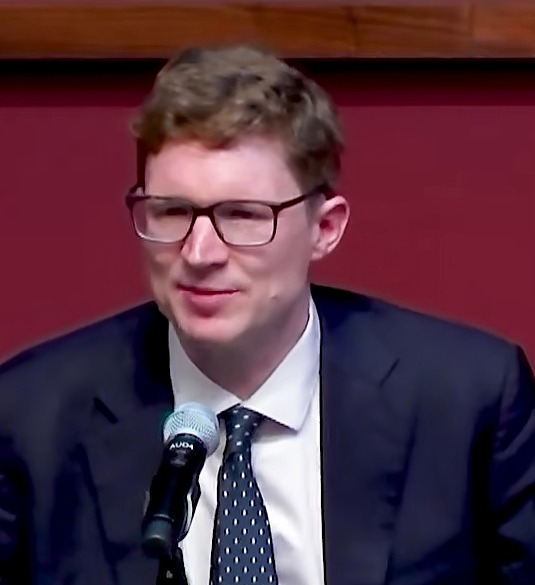 Oliver Bush speaking at a Hoover Institution conference.